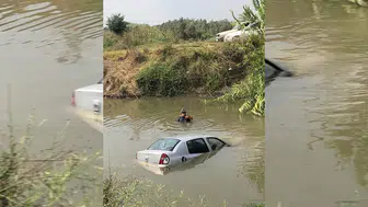 Nehre düşen otomobilin sürücüsü kendi çabasıyla kurtuldu