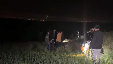 Tarlada boğazından kesik ceset bulundu