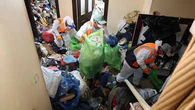 Kayseri'de bir evden 5 kamyon çöp çıkarıldı! Ev sahibi tedaviye alındı