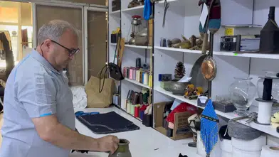 Yozgatlı terzi antika tutkusunu dükkanında yaşatıyor